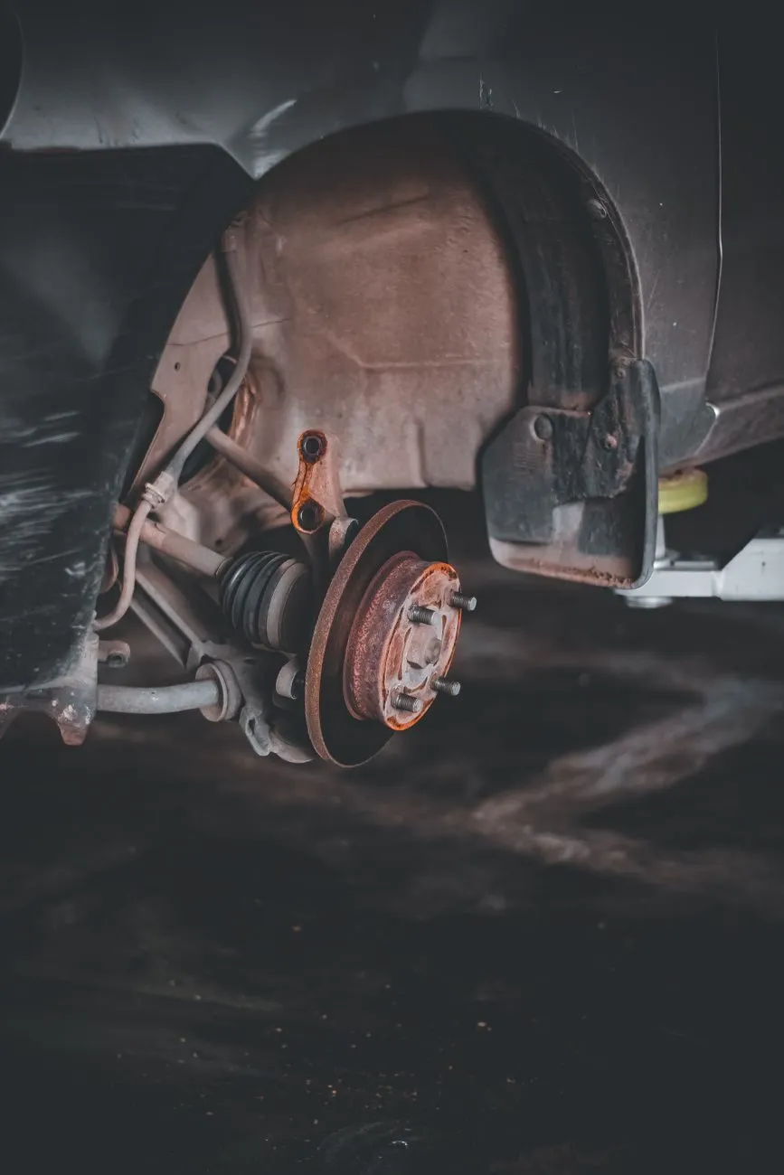 A worn brake disc photographed for the customer before any extra work