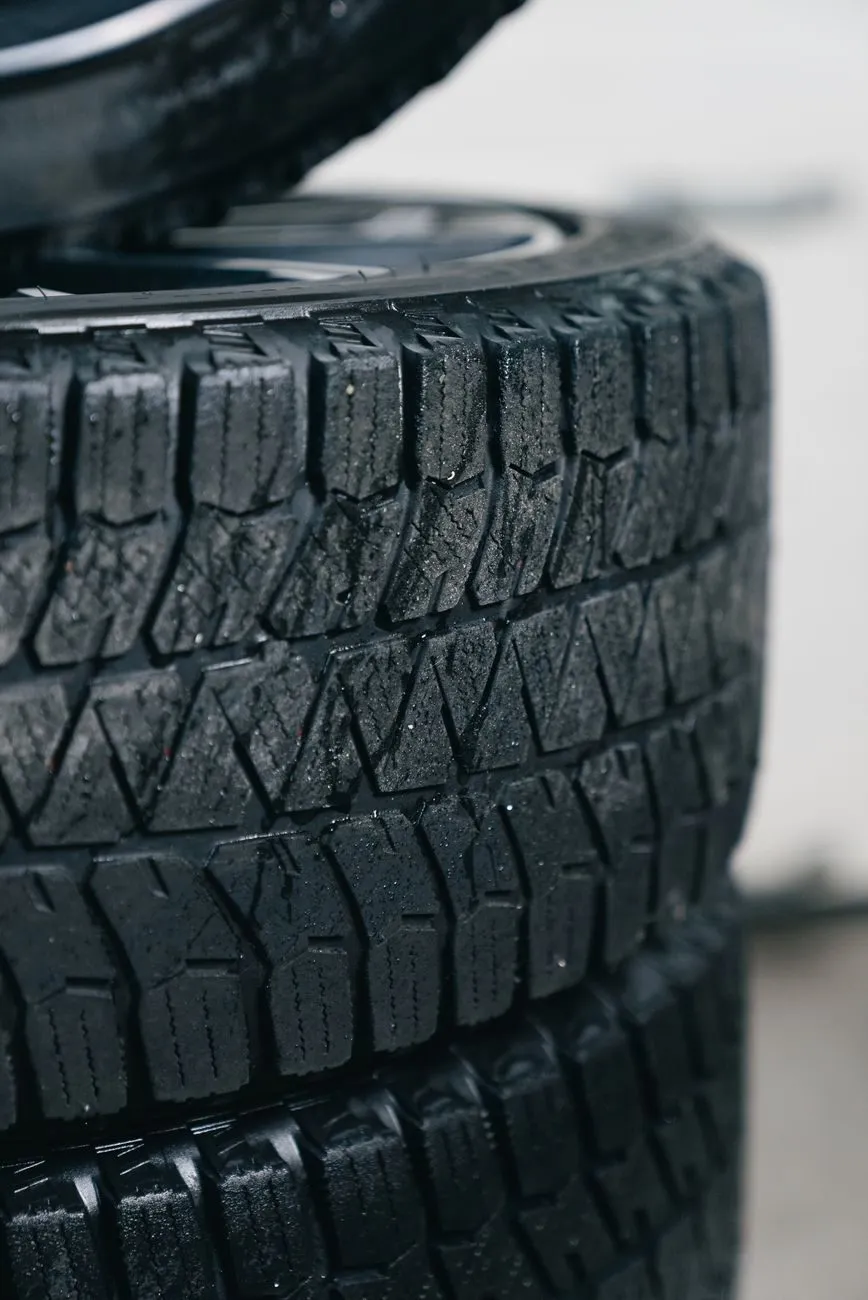 Close-up of the tread on a stack of car tyres
